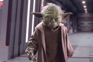 star-wars-master-yoda-with-a-determined-expression-on-his-face-holding-his-lightsaber-usagif