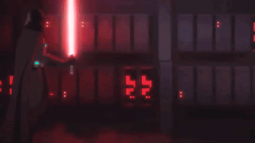 star-wars-vader-with-his-red-lightsaber-in-a-dark-high-tech-environment-usagif